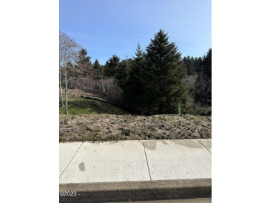 A great opportunity to purchase a large forested view lot in the on Chinook Winds Golf Resort in Oregon - for sale on GolfHomes.com, golf home, golf lot