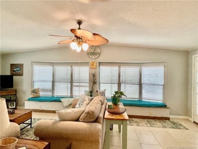 This charming residence boasts numerous delightful features. 2 on Indianwood Golf and Country Club in Florida - for sale on GolfHomes.com, golf home, golf lot