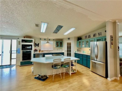 This charming residence boasts numerous delightful features. 2 on Indianwood Golf and Country Club in Florida - for sale on GolfHomes.com, golf home, golf lot