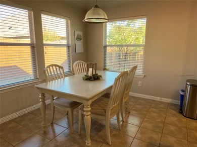 This very beautiful and well maintained 4-bedroom, 2-bath home on Eagle Mountain Country Club  in Texas - for sale on GolfHomes.com, golf home, golf lot