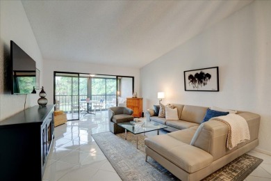 Well-maintained 2nd-floor condo with direct views of the 14th on Boca Delray Golf and Country Club in Florida - for sale on GolfHomes.com, golf home, golf lot