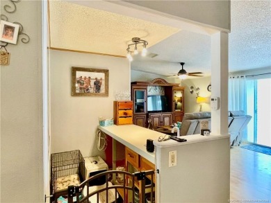 This charming residence boasts numerous delightful features. 2 on Indianwood Golf and Country Club in Florida - for sale on GolfHomes.com, golf home, golf lot