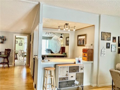 This charming residence boasts numerous delightful features. 2 on Indianwood Golf and Country Club in Florida - for sale on GolfHomes.com, golf home, golf lot