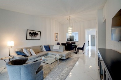 Well-maintained 2nd-floor condo with direct views of the 14th on Boca Delray Golf and Country Club in Florida - for sale on GolfHomes.com, golf home, golf lot