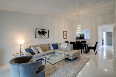 Well-maintained 2nd-floor condo with direct views of the 14th on Boca Delray Golf and Country Club in Florida - for sale on GolfHomes.com, golf home, golf lot