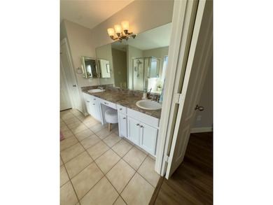 This very beautiful and well maintained 4-bedroom, 2-bath home on Eagle Mountain Country Club  in Texas - for sale on GolfHomes.com, golf home, golf lot