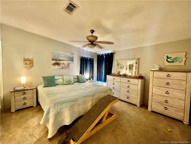 This charming residence boasts numerous delightful features. 2 on Indianwood Golf and Country Club in Florida - for sale on GolfHomes.com, golf home, golf lot