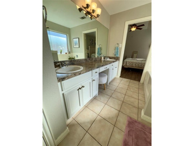 This very beautiful and well maintained 4-bedroom, 2-bath home on Eagle Mountain Country Club  in Texas - for sale on GolfHomes.com, golf home, golf lot