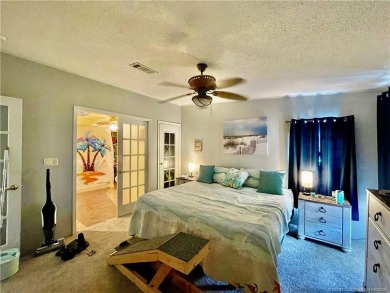 This charming residence boasts numerous delightful features. 2 on Indianwood Golf and Country Club in Florida - for sale on GolfHomes.com, golf home, golf lot