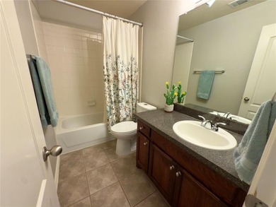 This very beautiful and well maintained 4-bedroom, 2-bath home on Eagle Mountain Country Club  in Texas - for sale on GolfHomes.com, golf home, golf lot