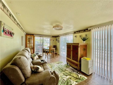 This charming residence boasts numerous delightful features. 2 on Indianwood Golf and Country Club in Florida - for sale on GolfHomes.com, golf home, golf lot