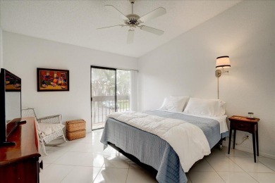 Well-maintained 2nd-floor condo with direct views of the 14th on Boca Delray Golf and Country Club in Florida - for sale on GolfHomes.com, golf home, golf lot