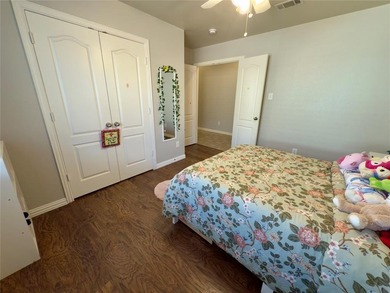 This very beautiful and well maintained 4-bedroom, 2-bath home on Eagle Mountain Country Club  in Texas - for sale on GolfHomes.com, golf home, golf lot