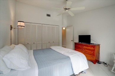 Well-maintained 2nd-floor condo with direct views of the 14th on Boca Delray Golf and Country Club in Florida - for sale on GolfHomes.com, golf home, golf lot
