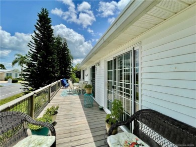 This charming residence boasts numerous delightful features. 2 on Indianwood Golf and Country Club in Florida - for sale on GolfHomes.com, golf home, golf lot