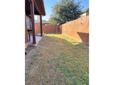 This very beautiful and well maintained 4-bedroom, 2-bath home on Eagle Mountain Country Club  in Texas - for sale on GolfHomes.com, golf home, golf lot