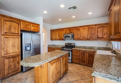 Enjoy resort-style living in this **Upgraded Two-Story on Rhodes Ranch Golf Club in Nevada - for sale on GolfHomes.com, golf home, golf lot