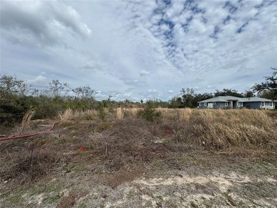 Envision your custom-built dream home rising on this exceptional on Sunnybreeze Golf Course in Florida - for sale on GolfHomes.com, golf home, golf lot