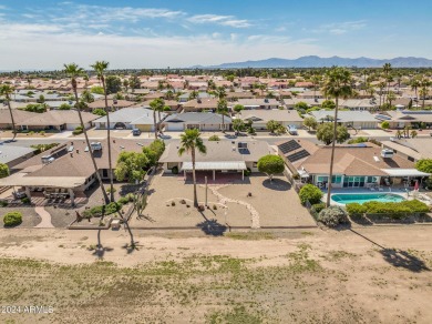 Don't miss this updated home positioned along a scenic double on Briarwood Country Club in Arizona - for sale on GolfHomes.com, golf home, golf lot