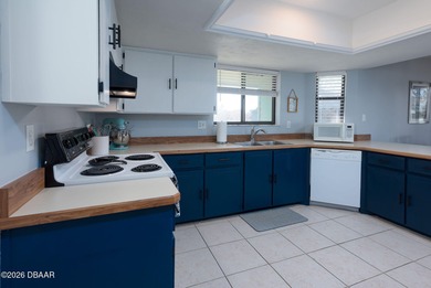 BEAUTIFUL WATER VIEWS! MAINTEANCE FREE LIVING! RACE FANS on The Club At Pelican Bay - North Course in Florida - for sale on GolfHomes.com, golf home, golf lot