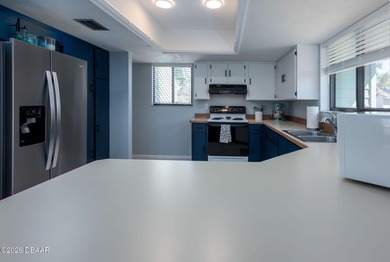 BEAUTIFUL WATER VIEWS! MAINTEANCE FREE LIVING! RACE FANS on The Club At Pelican Bay - North Course in Florida - for sale on GolfHomes.com, golf home, golf lot