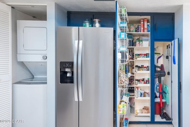 BEAUTIFUL WATER VIEWS! MAINTEANCE FREE LIVING! RACE FANS on The Club At Pelican Bay - North Course in Florida - for sale on GolfHomes.com, golf home, golf lot