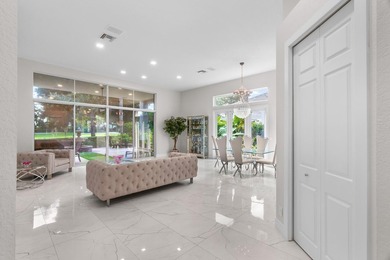 Step inside this beautifully updated home and enjoy a bright on Addison Reserve in Florida - for sale on GolfHomes.com, golf home, golf lot