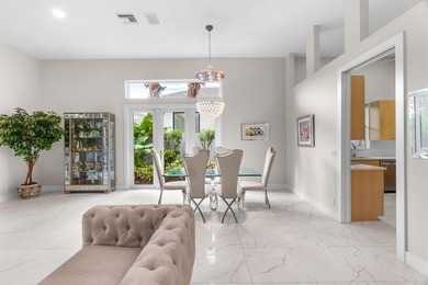 Step inside this beautifully updated home and enjoy a bright on Addison Reserve in Florida - for sale on GolfHomes.com, golf home, golf lot