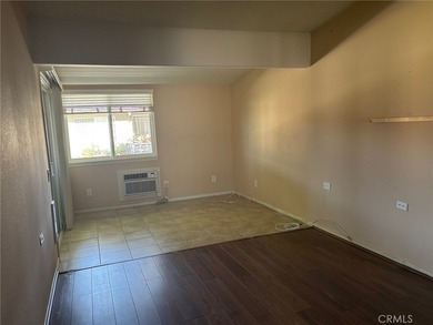 M6 143I. This partially extended unit is located in a central on Leisure World Seal Beach Golf Course in California - for sale on GolfHomes.com, golf home, golf lot