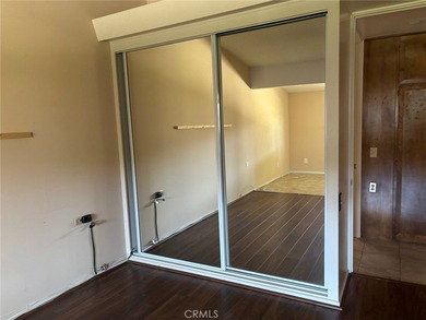 M6 143I. This partially extended unit is located in a central on Leisure World Seal Beach Golf Course in California - for sale on GolfHomes.com, golf home, golf lot