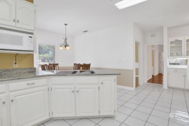 This spacious 4-bedroom, 2.5-bathroom home is perfectly situated on Lake Forest Yacht and Country Club in Alabama - for sale on GolfHomes.com, golf home, golf lot