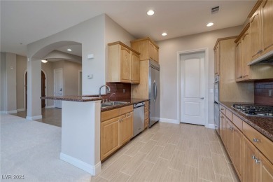 Beautiful single level Lake Las Vegas condo in the highly on Reflection Bay Golf Club in Nevada - for sale on GolfHomes.com, golf home, golf lot