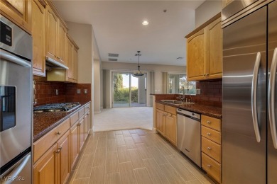 Beautiful single level Lake Las Vegas condo in the highly on Reflection Bay Golf Club in Nevada - for sale on GolfHomes.com, golf home, golf lot