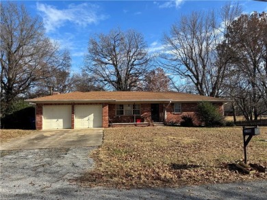 This Ranch style home features 3 beds and 2 baths, an open on Baxter Country Club in Kansas - for sale on GolfHomes.com, golf home, golf lot