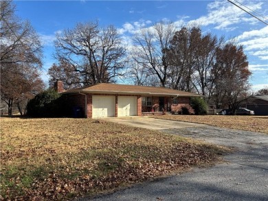 This Ranch style home features 3 beds and 2 baths, an open on Baxter Country Club in Kansas - for sale on GolfHomes.com, golf home, golf lot