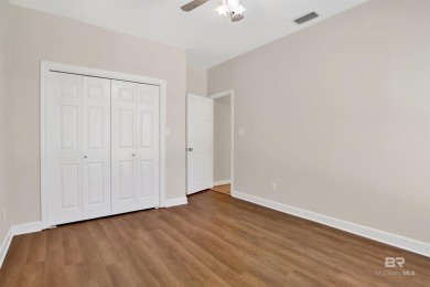 This spacious 4-bedroom, 2.5-bathroom home is perfectly situated on Lake Forest Yacht and Country Club in Alabama - for sale on GolfHomes.com, golf home, golf lot