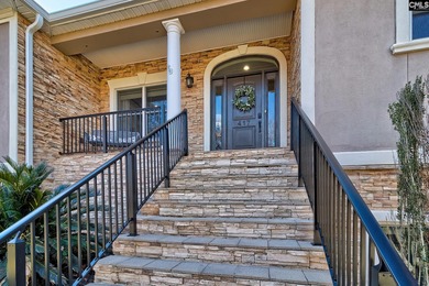 Welcome to 417 Oxenbridge Way in Chapin's desirable lake-front on Timberlake Country Club in South Carolina - for sale on GolfHomes.com, golf home, golf lot