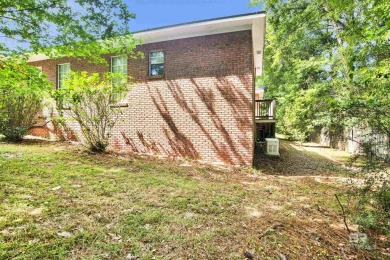 This spacious 4-bedroom, 2.5-bathroom home is perfectly situated on Lake Forest Yacht and Country Club in Alabama - for sale on GolfHomes.com, golf home, golf lot