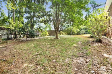 This spacious 4-bedroom, 2.5-bathroom home is perfectly situated on Lake Forest Yacht and Country Club in Alabama - for sale on GolfHomes.com, golf home, golf lot