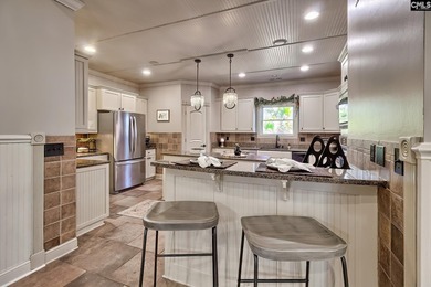 Welcome to 417 Oxenbridge Way in Chapin's desirable lake-front on Timberlake Country Club in South Carolina - for sale on GolfHomes.com, golf home, golf lot