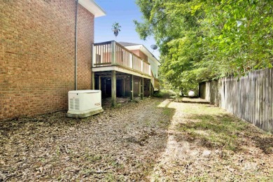 This spacious 4-bedroom, 2.5-bathroom home is perfectly situated on Lake Forest Yacht and Country Club in Alabama - for sale on GolfHomes.com, golf home, golf lot