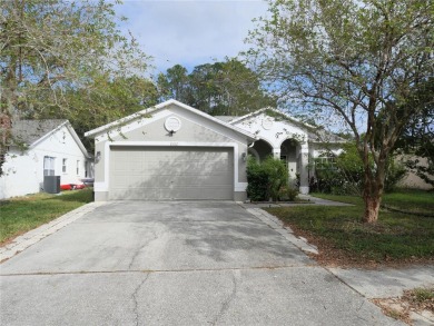 Welcome to this beautiful 4-bedroom, 2-bathroom home located in on The Eagles Golf Course and Club in Florida - for sale on GolfHomes.com, golf home, golf lot