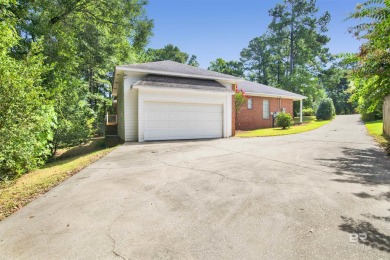 This spacious 4-bedroom, 2.5-bathroom home is perfectly situated on Lake Forest Yacht and Country Club in Alabama - for sale on GolfHomes.com, golf home, golf lot