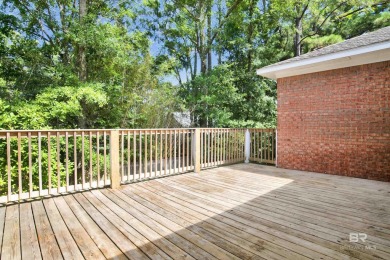This spacious 4-bedroom, 2.5-bathroom home is perfectly situated on Lake Forest Yacht and Country Club in Alabama - for sale on GolfHomes.com, golf home, golf lot