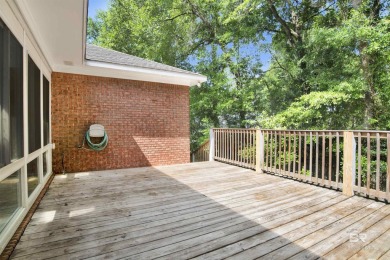 This spacious 4-bedroom, 2.5-bathroom home is perfectly situated on Lake Forest Yacht and Country Club in Alabama - for sale on GolfHomes.com, golf home, golf lot