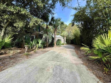 Located on a quiet cul-de-sac inside The Reserve, a gated on The Reserve Golf Club at Pawleys Island in South Carolina - for sale on GolfHomes.com, golf home, golf lot