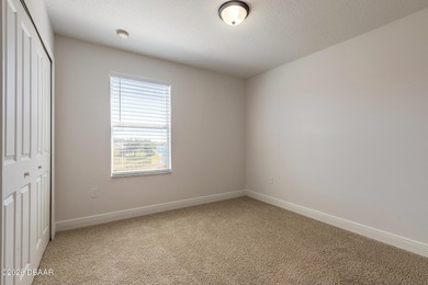 This beautiful, well-maintained home perfectly blends comfort on LPGA International Golf Course in Florida - for sale on GolfHomes.com, golf home, golf lot