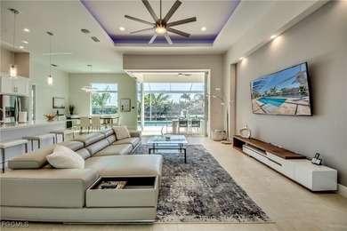 Experience true Florida living in this beautifully appointed on Royal Tee Country Club in Florida - for sale on GolfHomes.com, golf home, golf lot