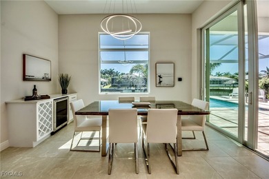 Experience true Florida living in this beautifully appointed on Royal Tee Country Club in Florida - for sale on GolfHomes.com, golf home, golf lot