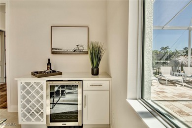 Experience true Florida living in this beautifully appointed on Royal Tee Country Club in Florida - for sale on GolfHomes.com, golf home, golf lot